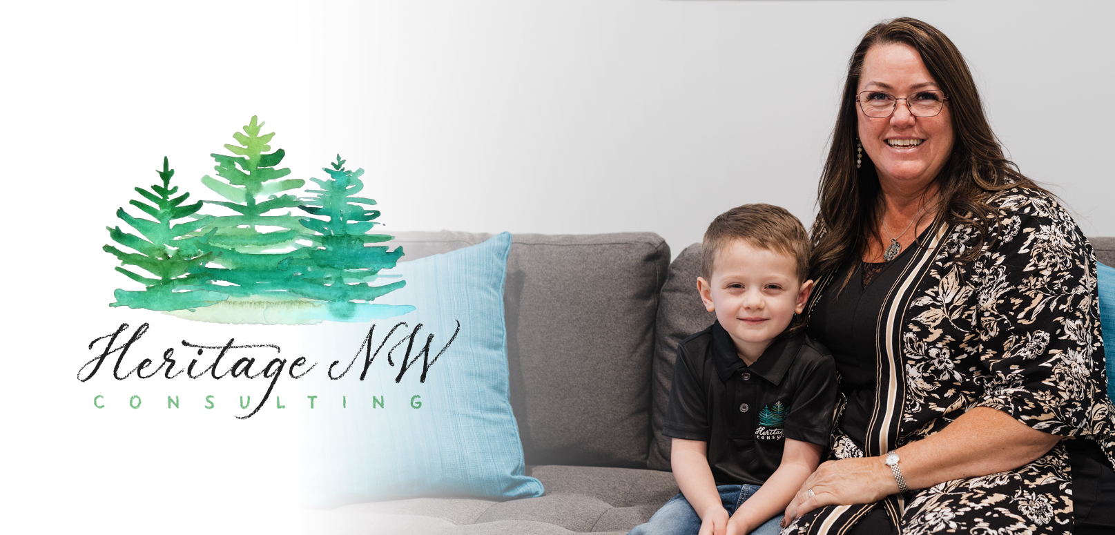 heritage nw consulting logo with the owner, Tara and a child sitting on a couch